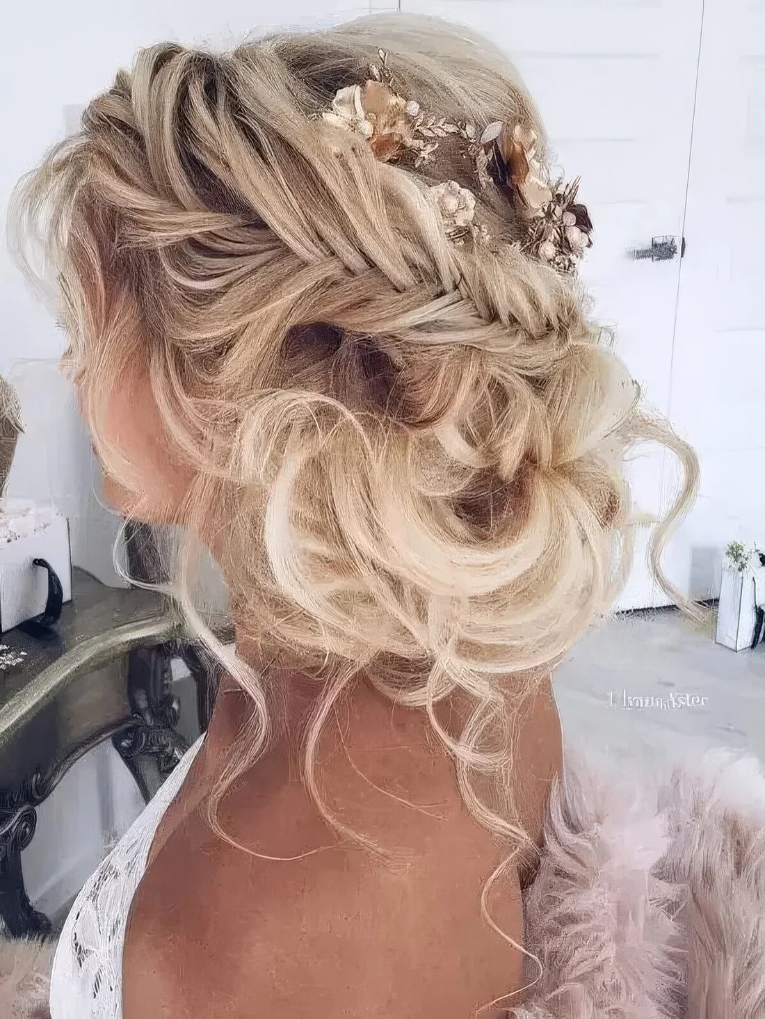 Photo showing casual messy updo, with the hairstyle clearly visible.