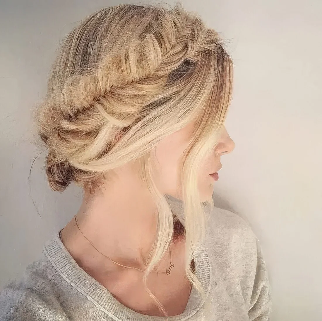 Fishtail braid halo updo with locks down.
