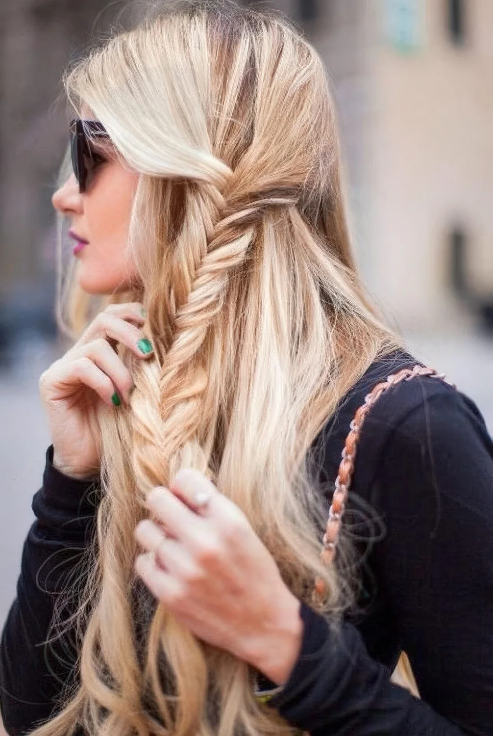 Half updo with a side fishtail braid.