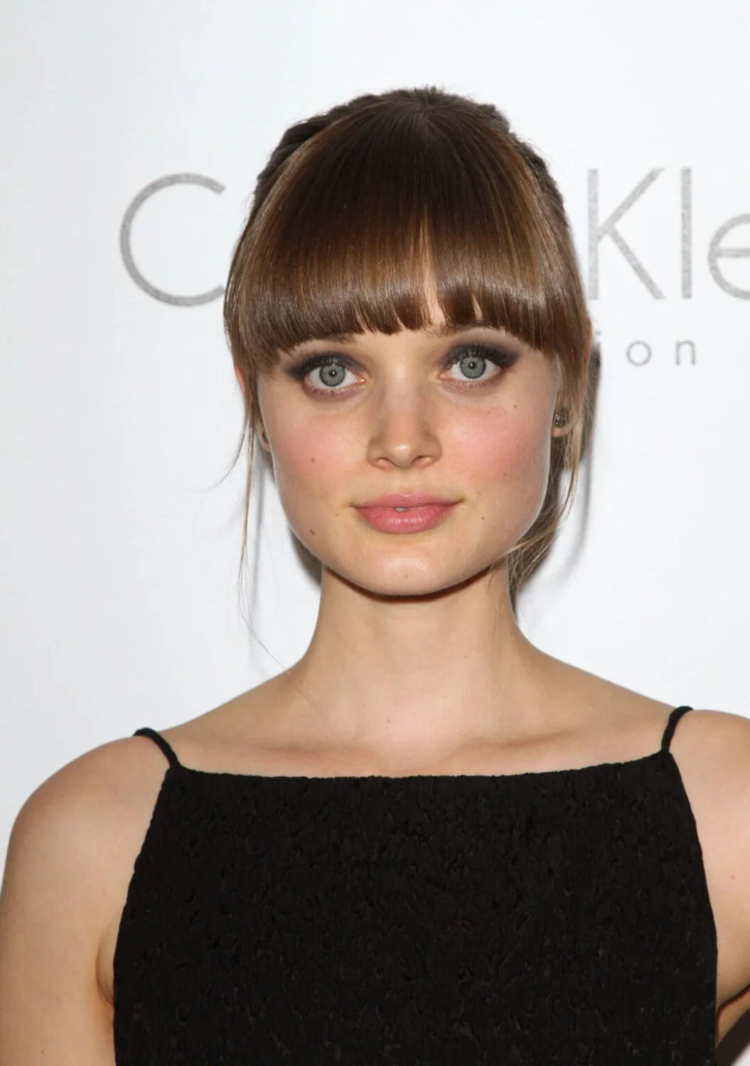 Blunt Fringe With a Neat Summer Updo.