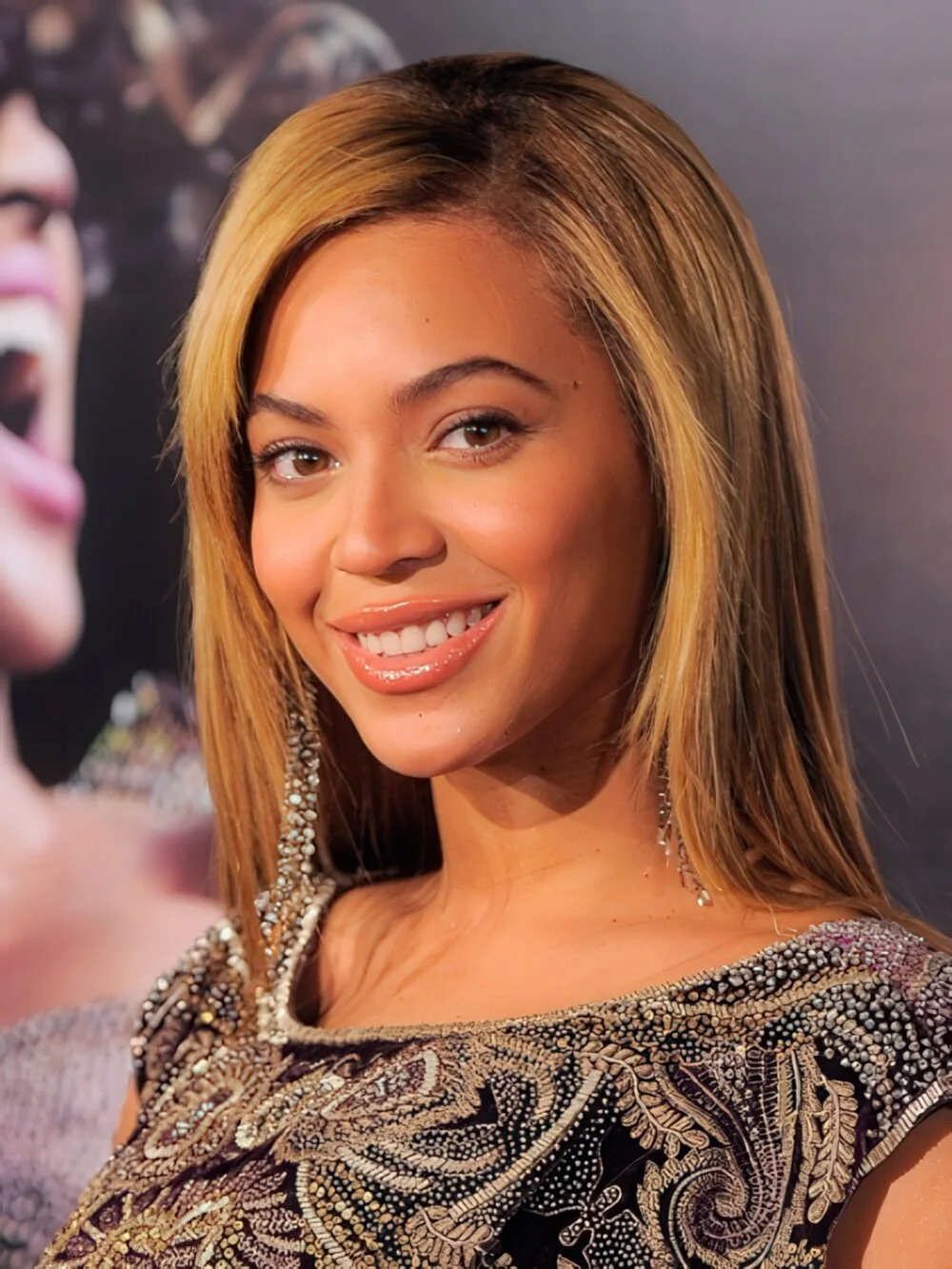 Long straight highlighted layers with a center part.