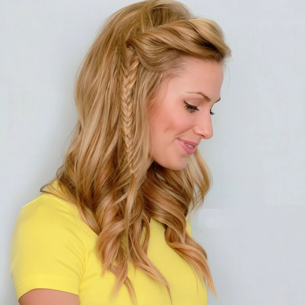 Bangs braided into a side half-up style.