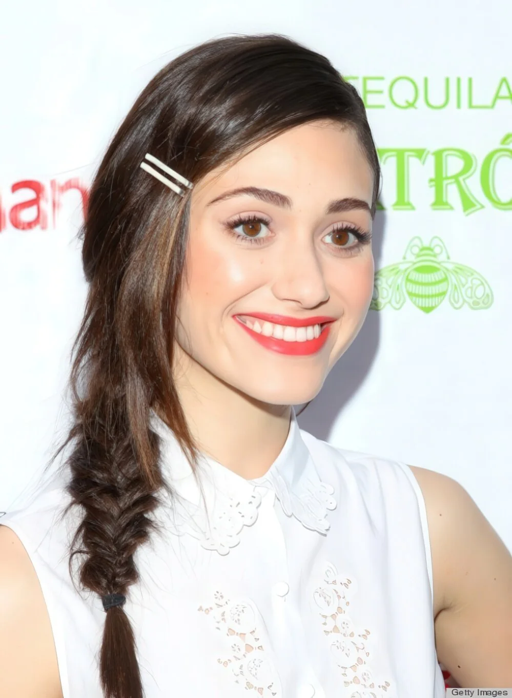 Side braid with bangs held by two hairpins.