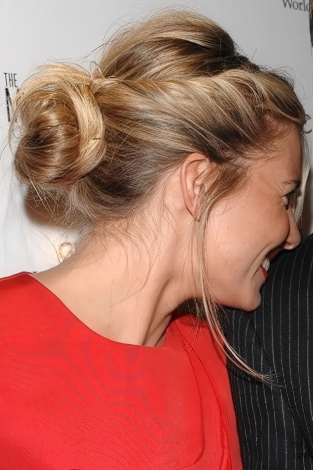 Messy high bun with a twisted front.