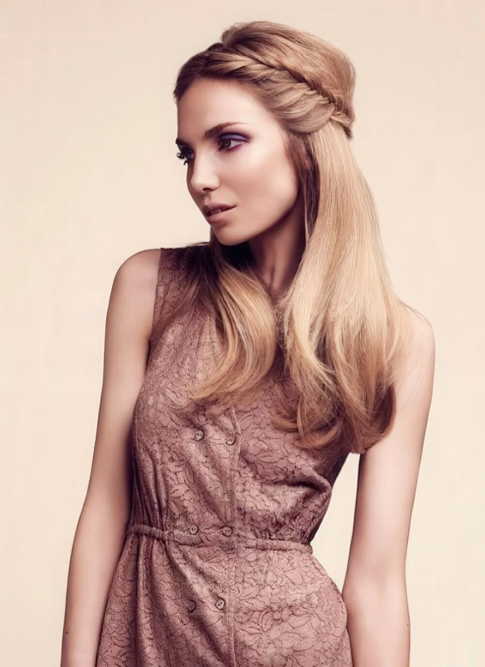 Half-up twist on long straight hair.