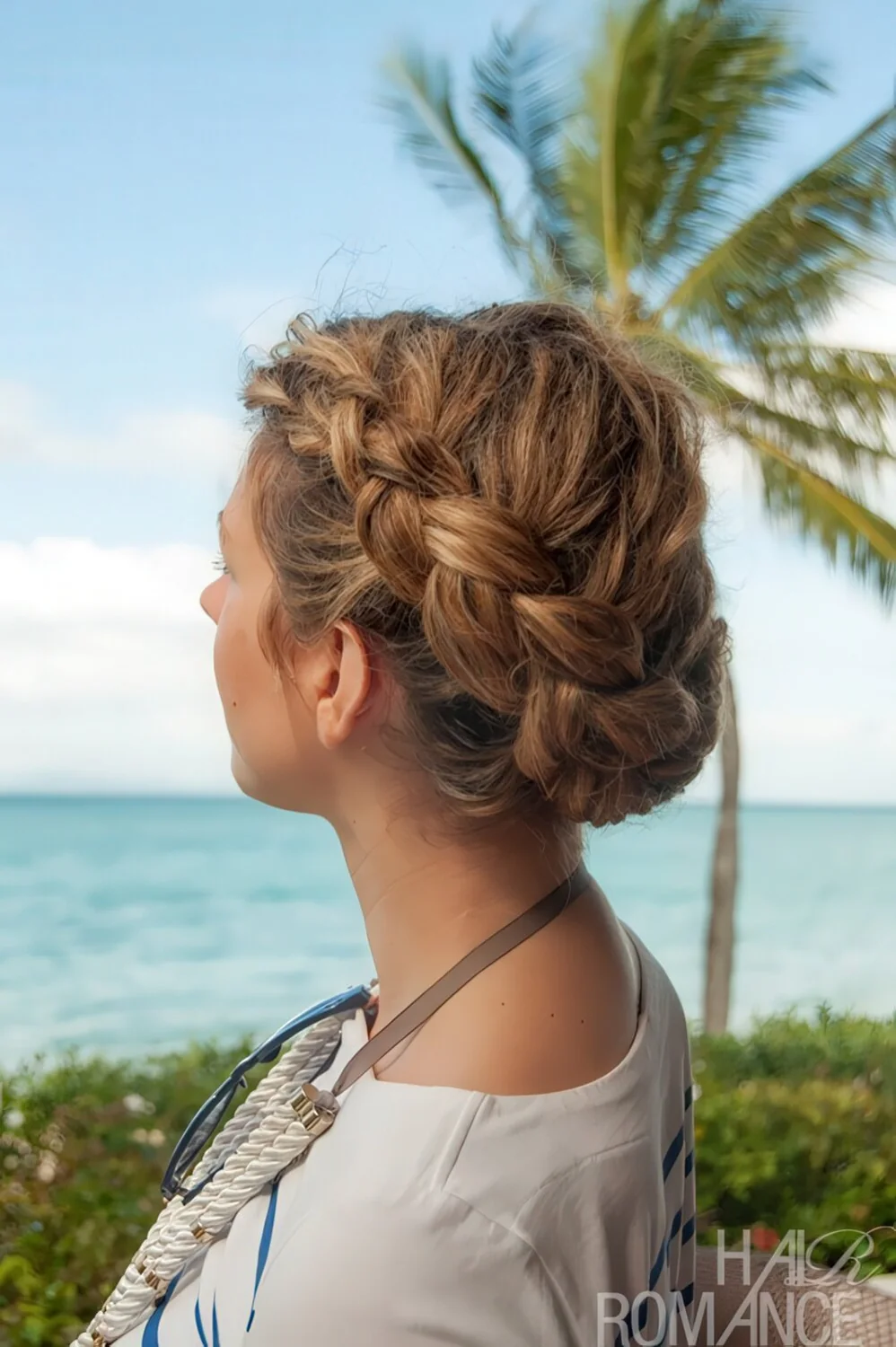 Braided crown gathered into a low bun.