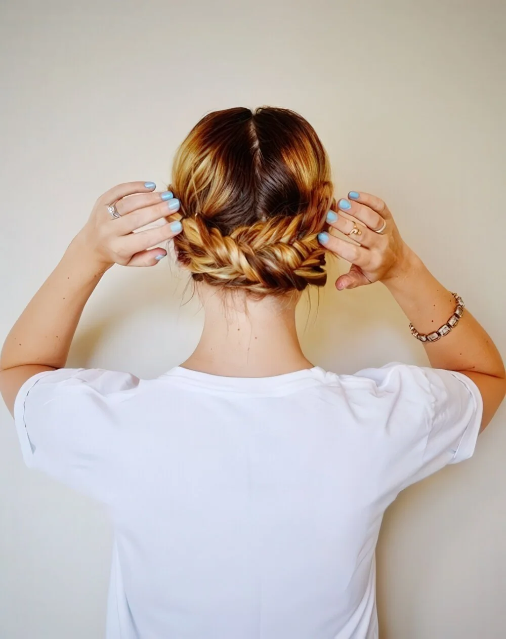 Braided low chignon viewed from the back.