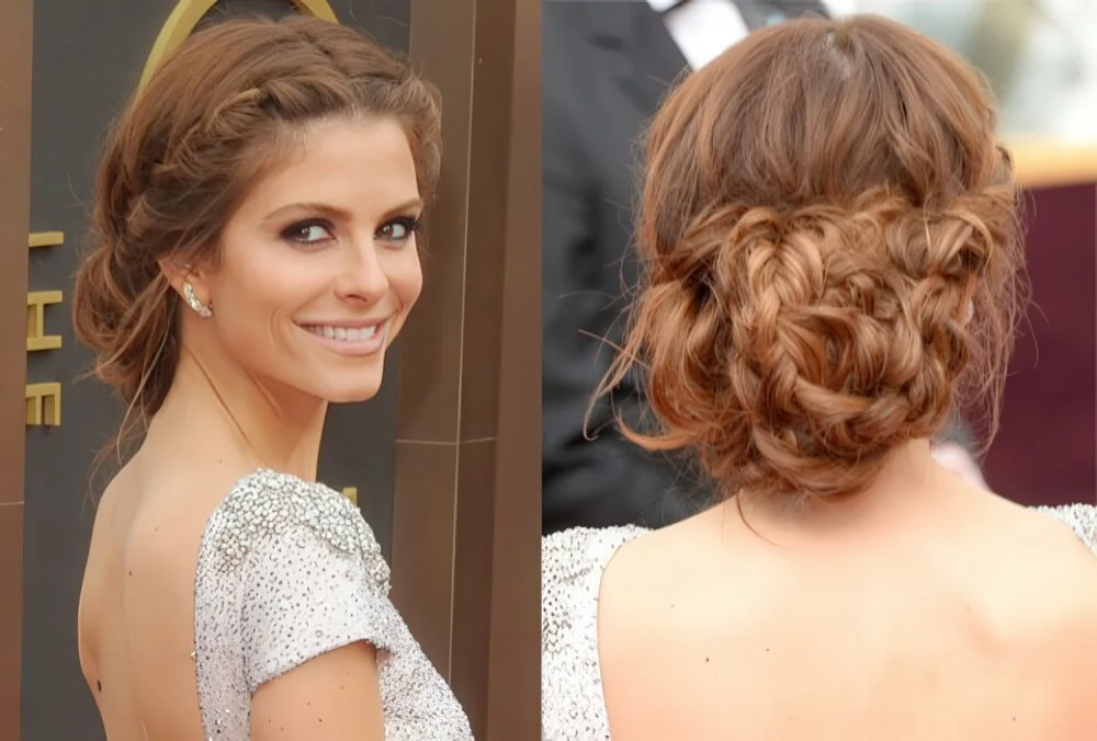 Photo showing braided brunette low updo, with the hairstyle clearly visible.