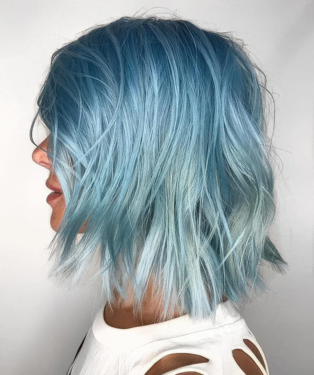 Photo showing icy blue hairstyle, with the hairstyle clearly visible.