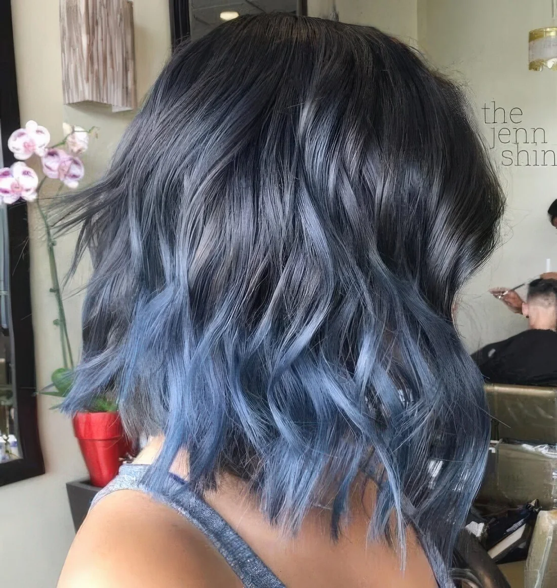 Photo showing wavy bob hairstyle, with the hairstyle clearly visible.
