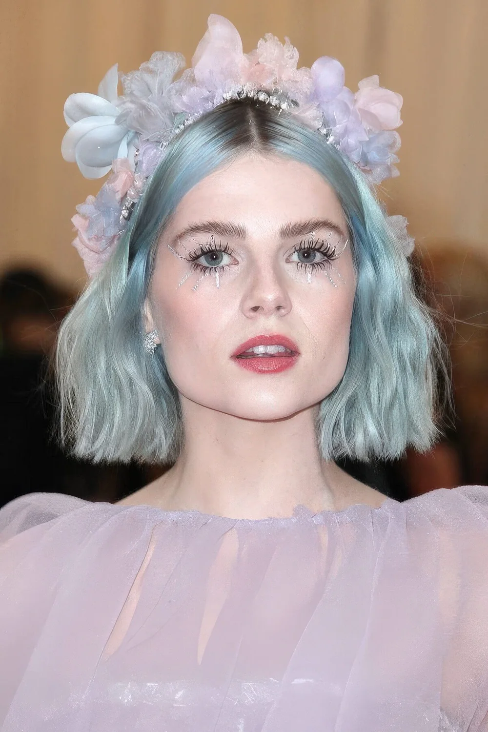 Aqua wavy midi bob with center part.