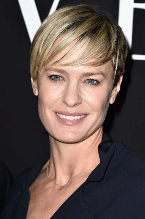 Polished pixie with side-swept fringe.