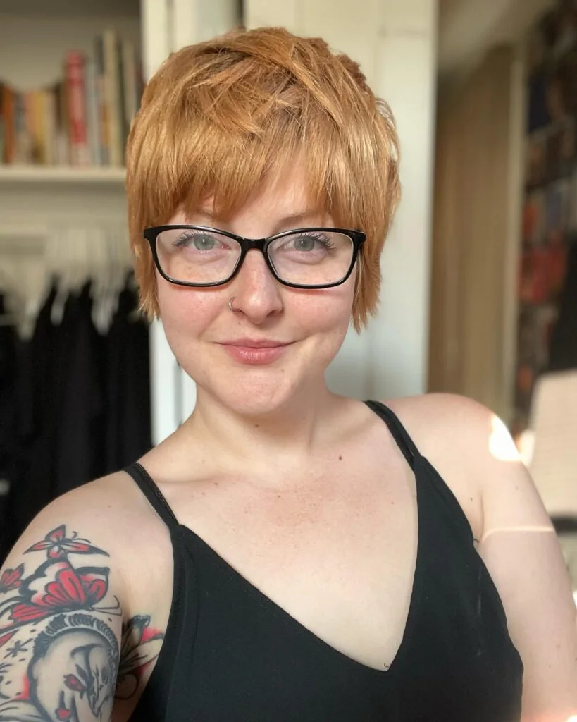 Copper pixie with soft tousled layers.