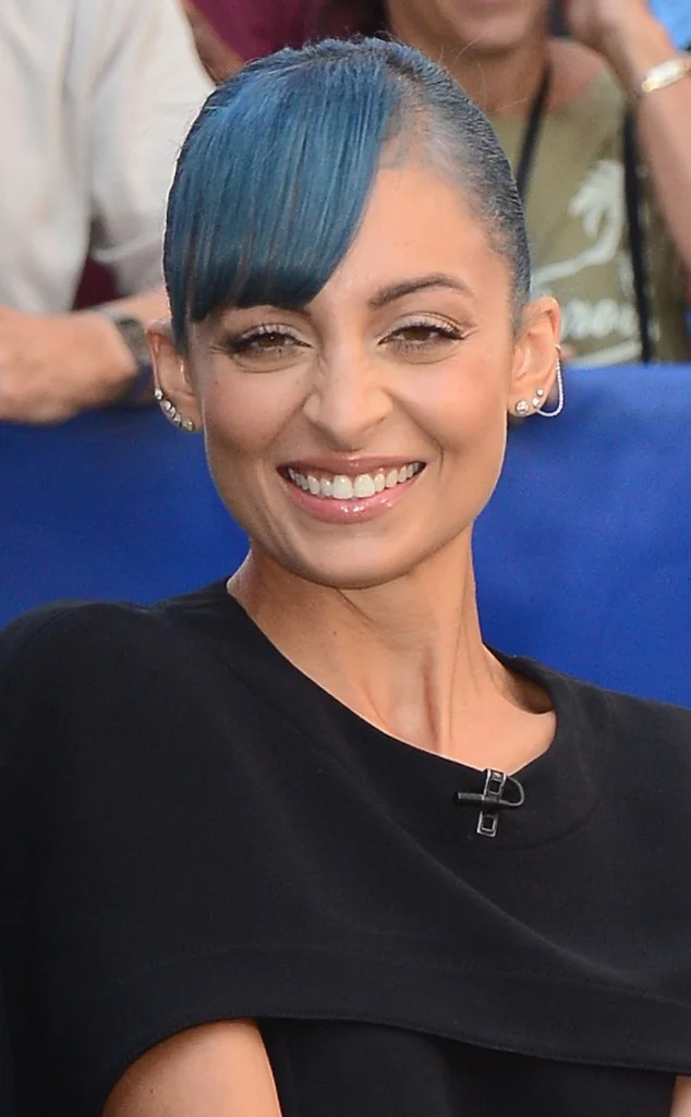 Sleek blue pixie with a side sweep.