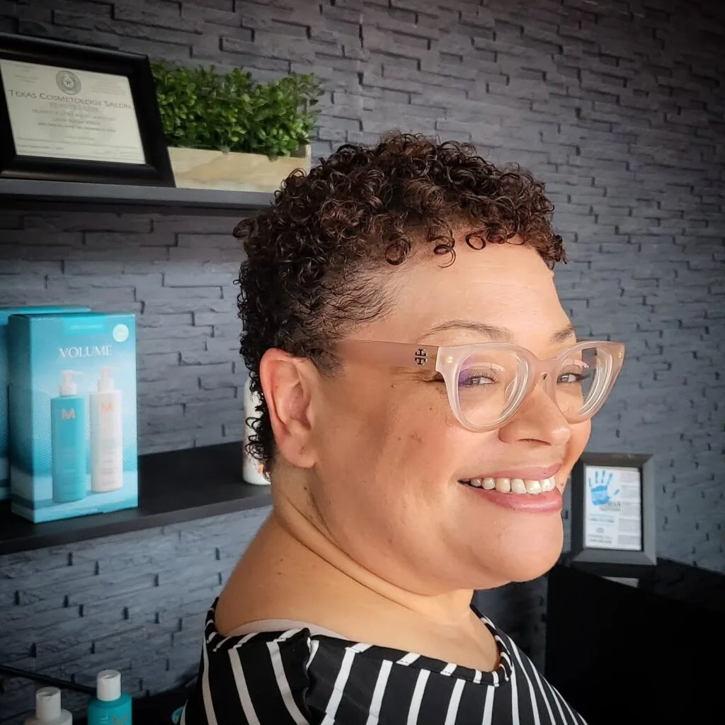 Close curly pixie with defined texture.