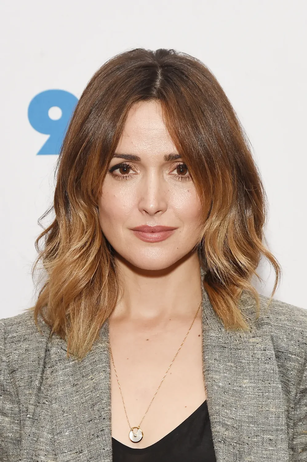 Wavy ombre lob with a balanced center part.