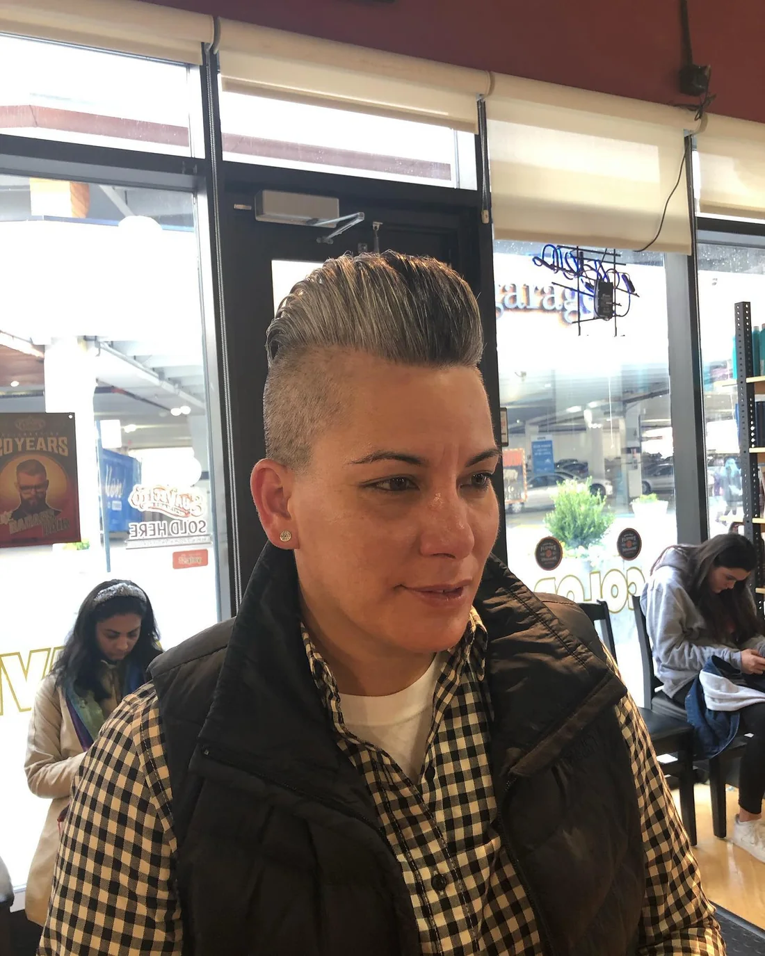 Slick Undercut With Swept Back Volume.