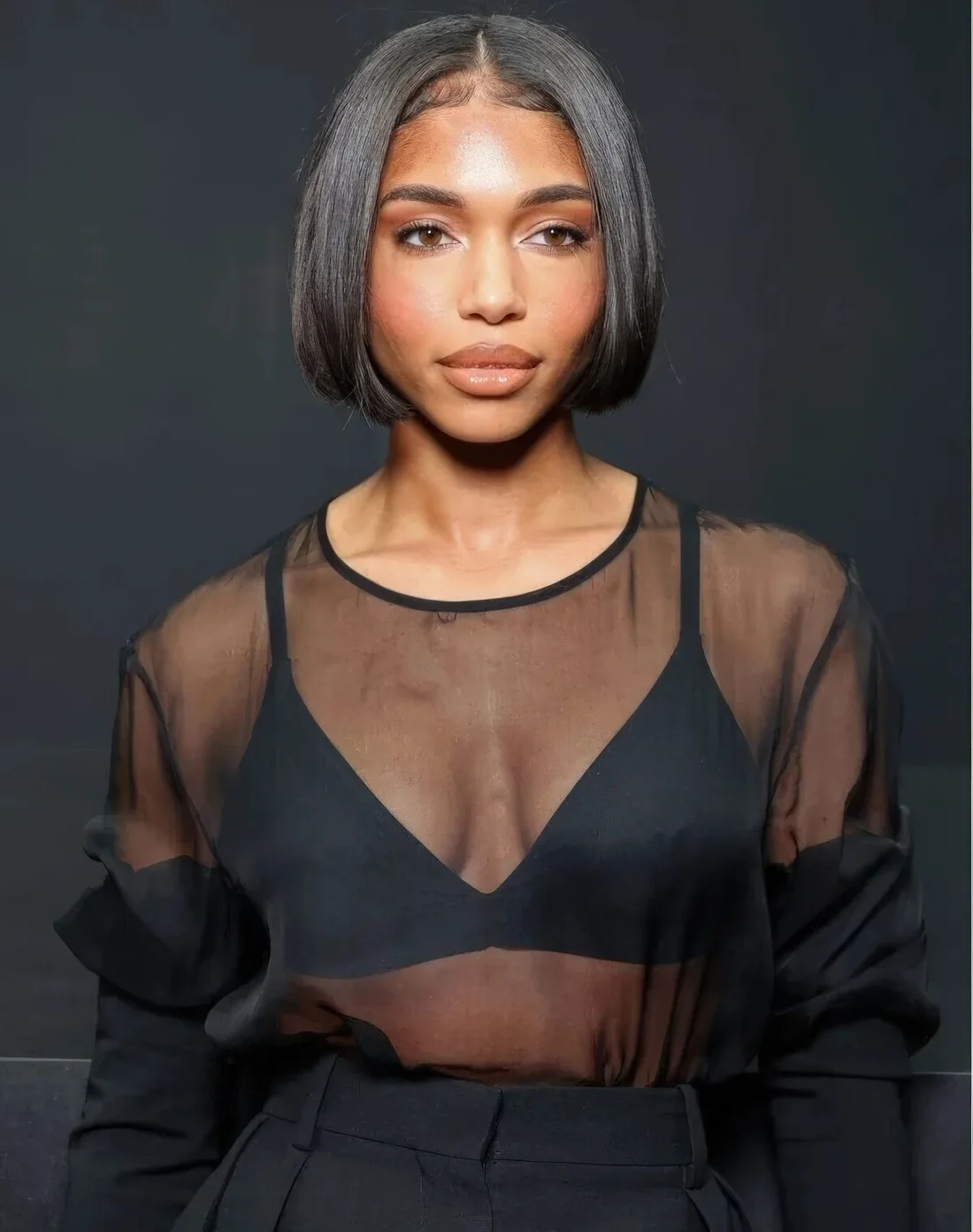 Lori Harvey wears her bob with classic runway styling-the sleek middle part and ends flipped inward scream Naomi Campbell in the ’90s.