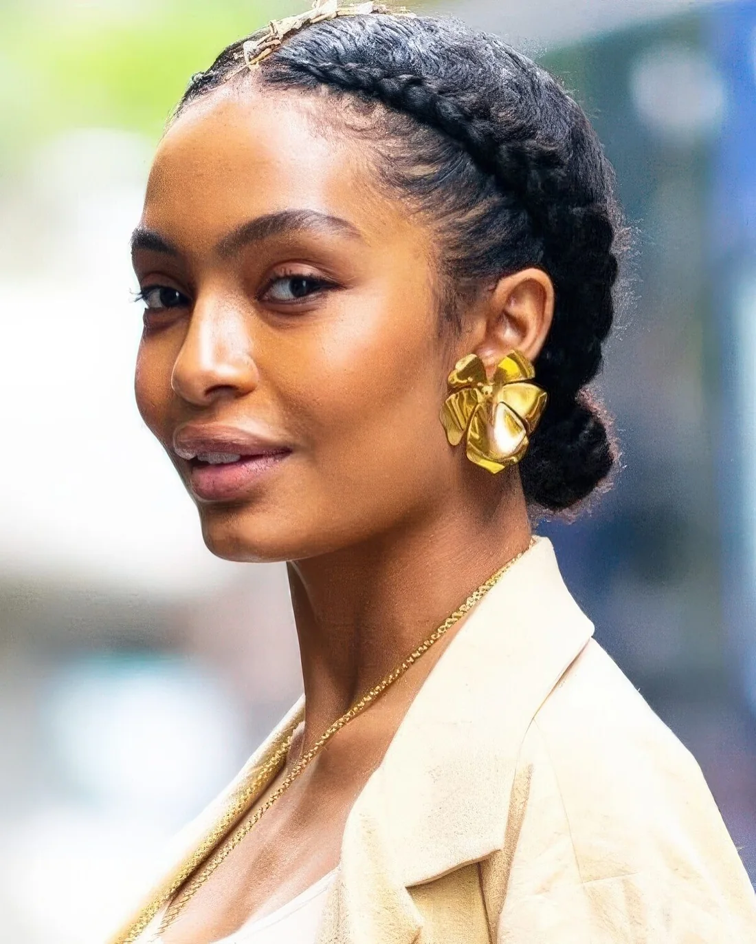 Photo showing low bun hairstyle, with the hairstyle clearly visible.