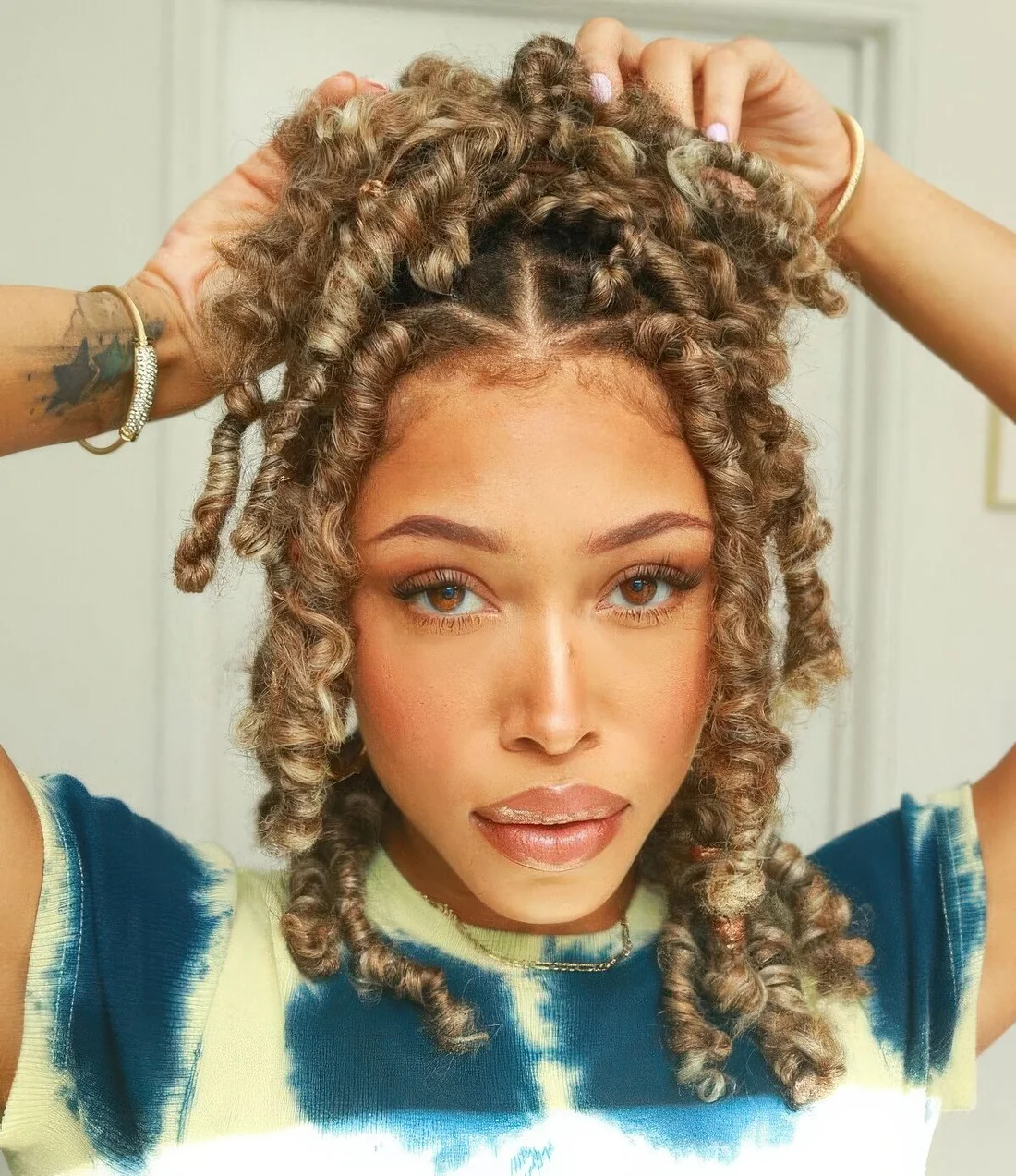 Photo showing half updo hairstyle, with the hairstyle clearly visible.