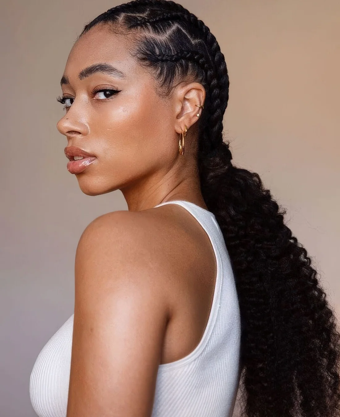 Cornrows and a ponytail together look very nice, wrap some braids around your ponytail.