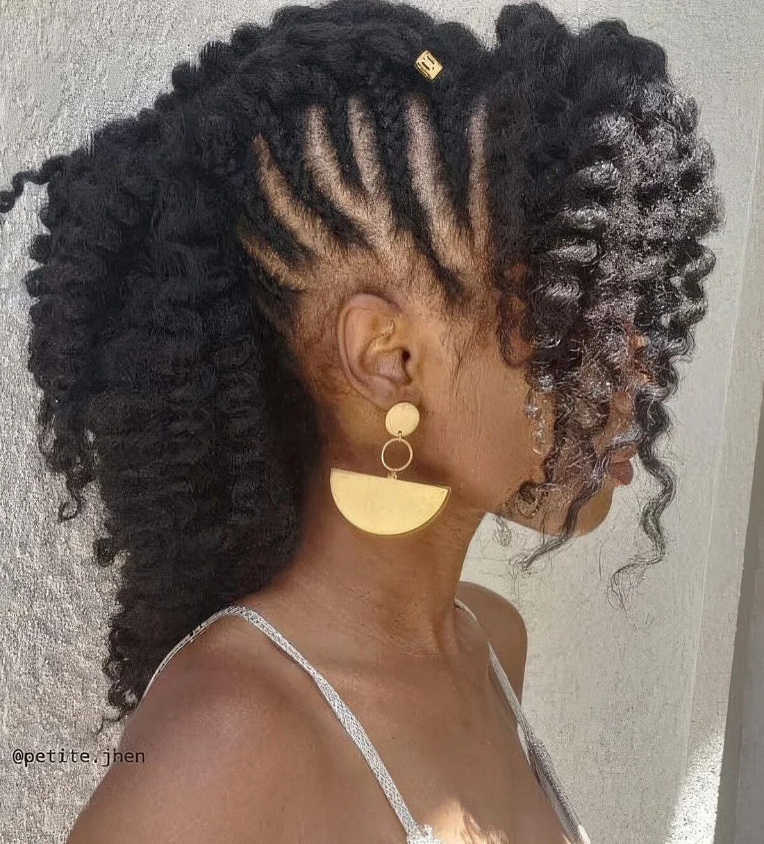 For this look, the sides of the hair are braided but the back and front of the hair.