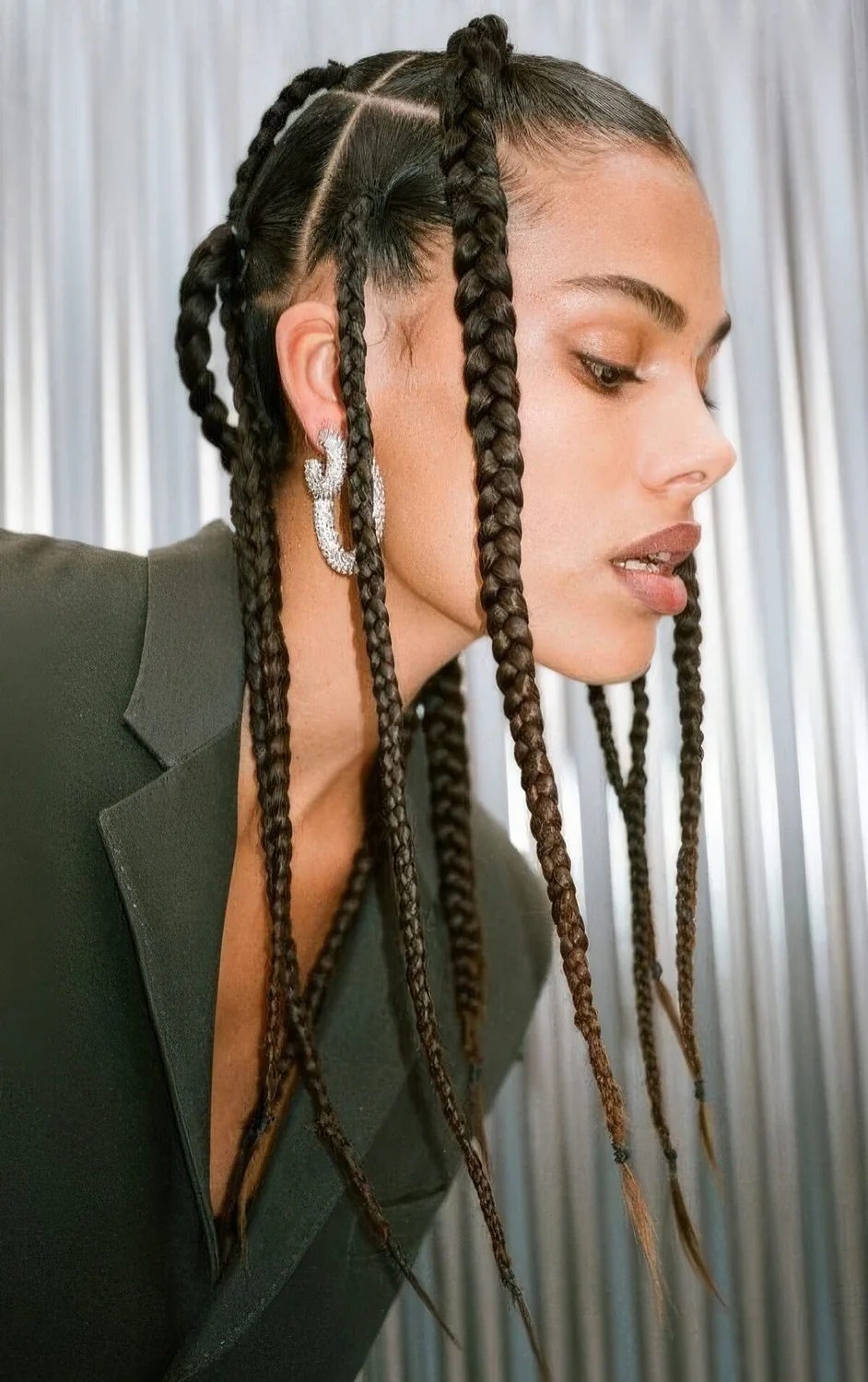 Long braids down are a super cool, bold and edgy hairstyle.