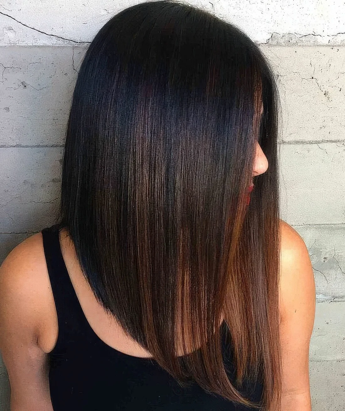 Angled black bob with touches of burgundy.