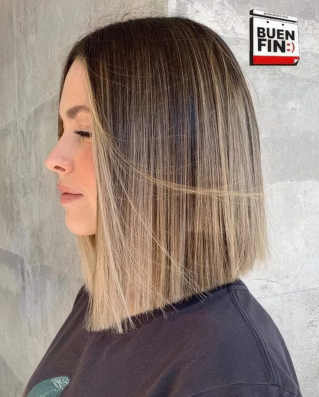 Angled long bob with blonde balayage.
