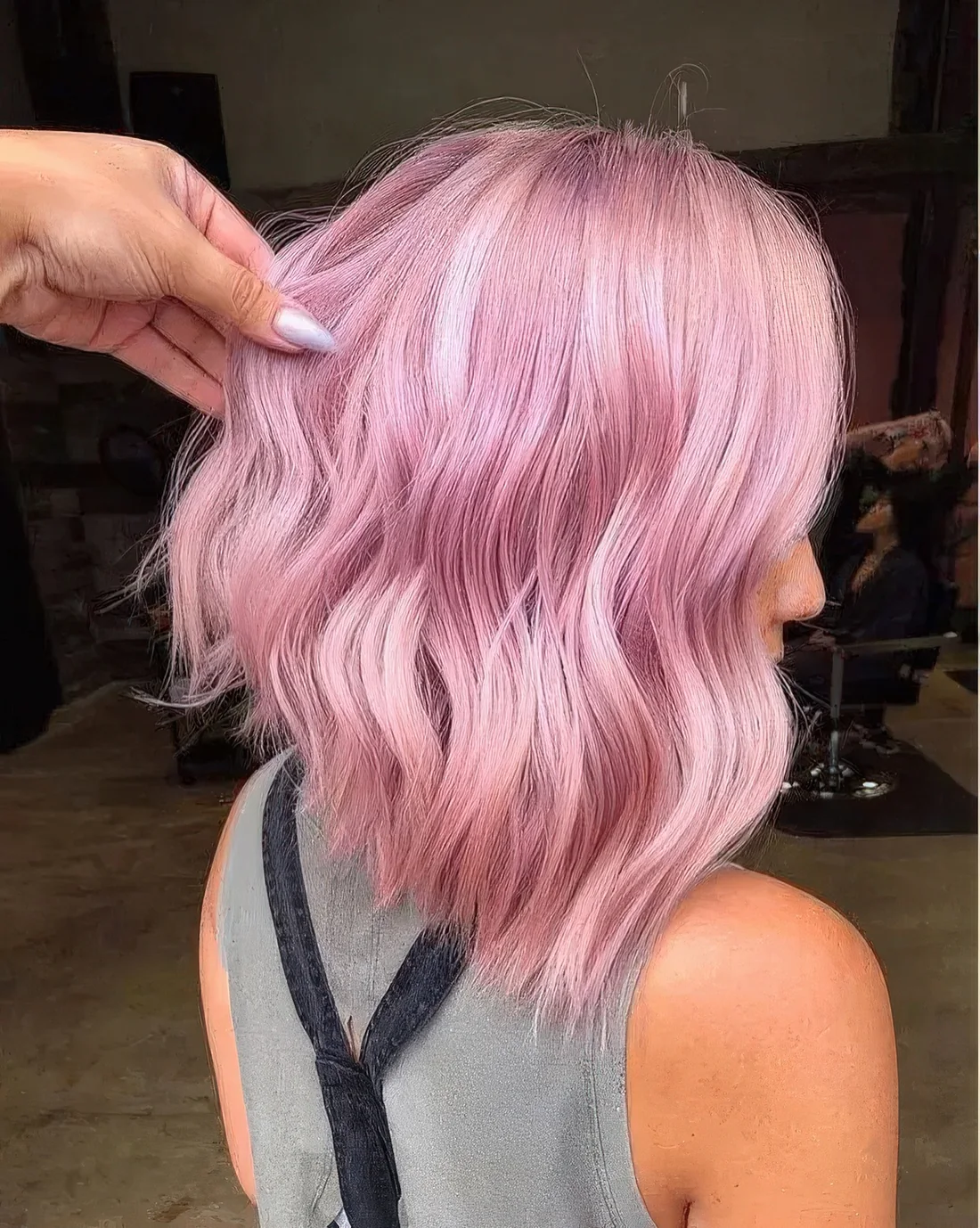 Photo showing pink bob hairstyle, with the hairstyle clearly visible.