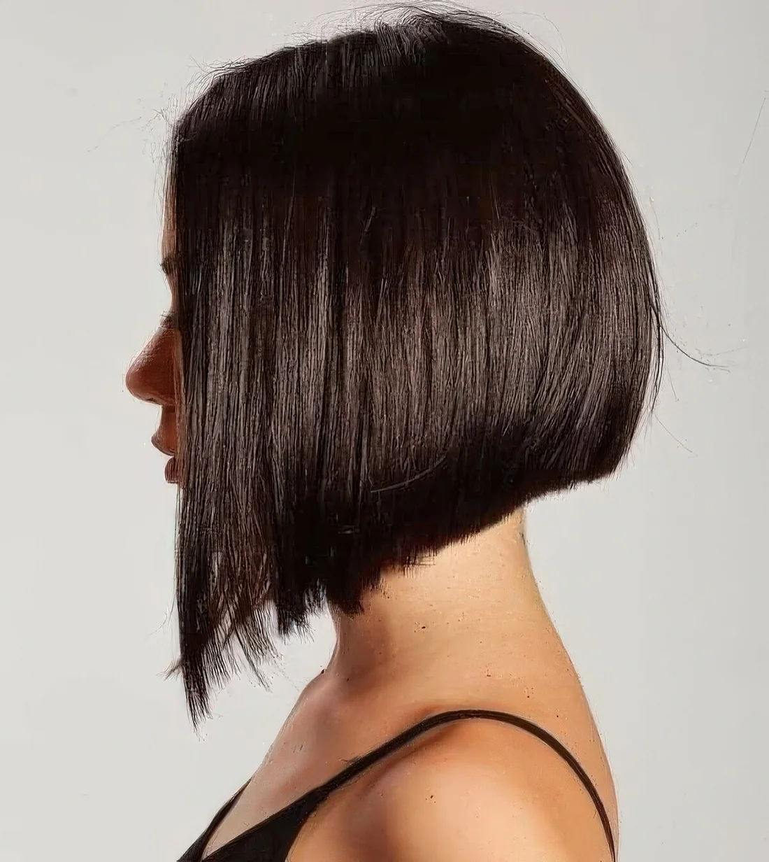 Dark brunette A line bob with a lot of volume and a shiny touch.