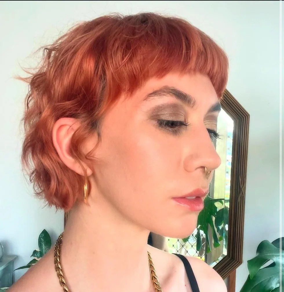 chin wavy copper color with micro fringe shown as a baby bangs idea