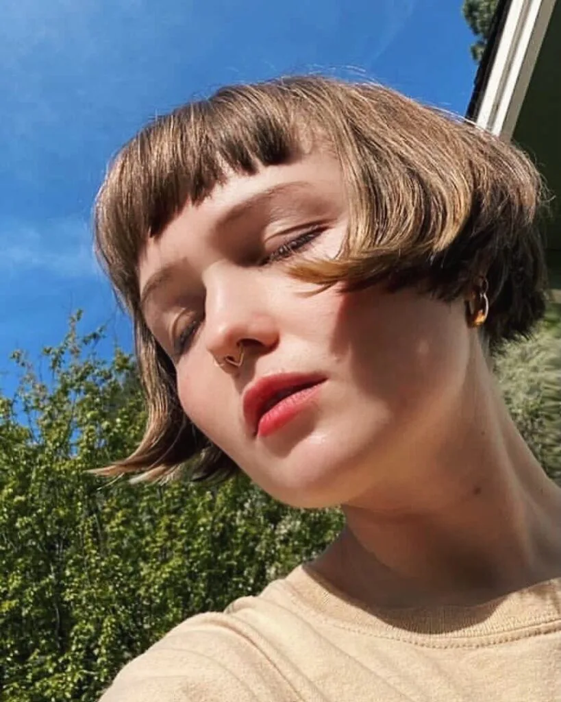 jaw straight chestnut bob with micro fringe shown as a baby bangs idea