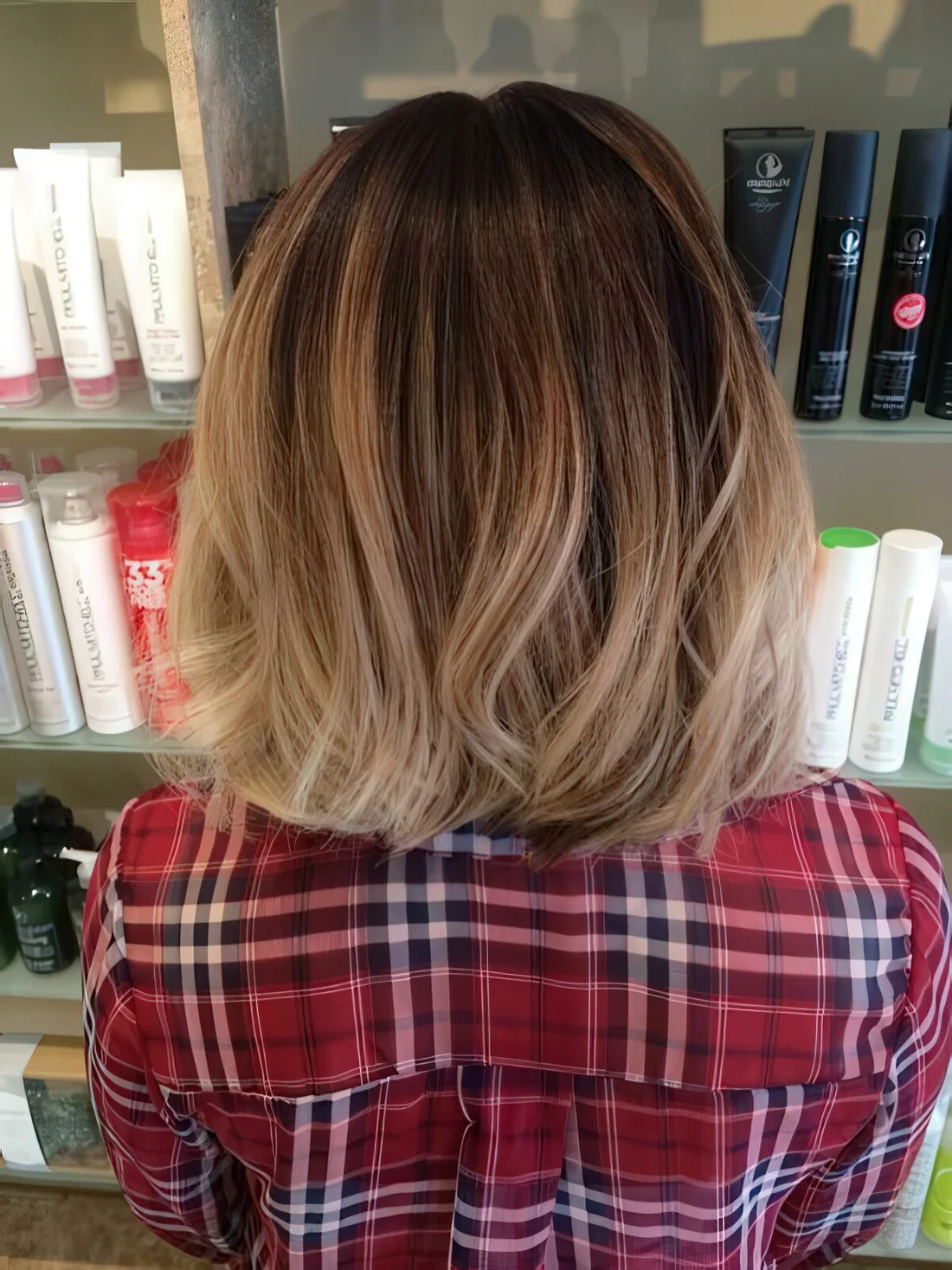 Photo showing brown bob with bronde balayage, with the hairstyle clearly visible.