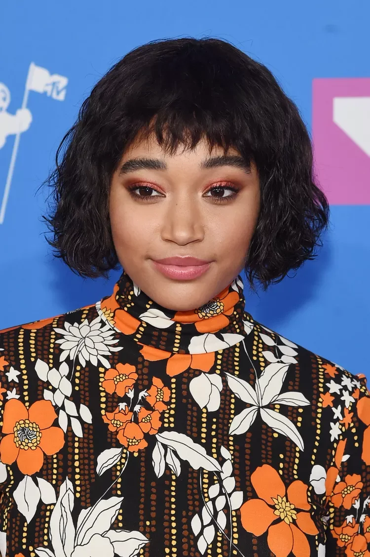 chin curly black bob with curly fringe fringe shown as a bangs for round face idea