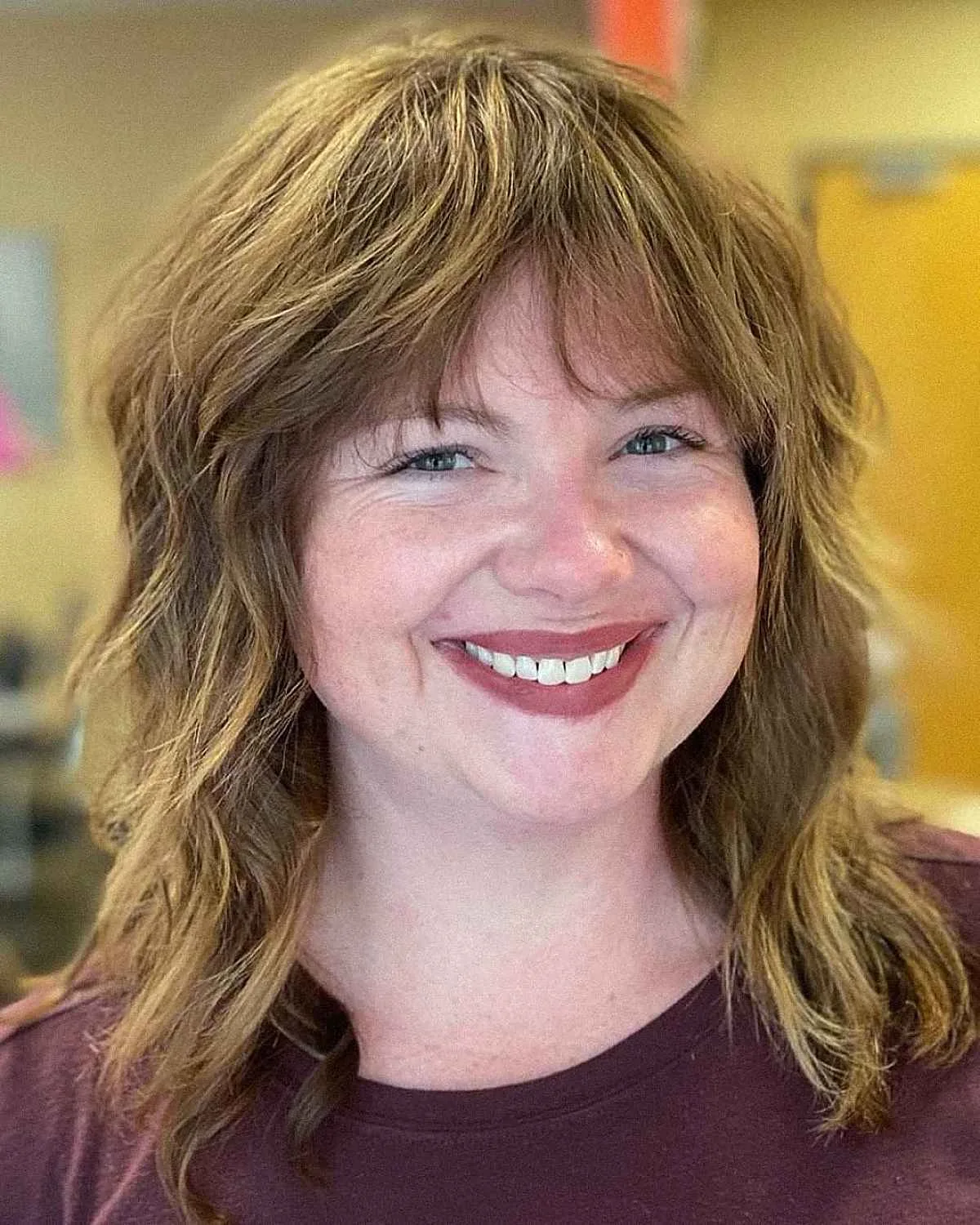 shoulder wavy honey shag with curtain fringe shown as a bangs for round face idea