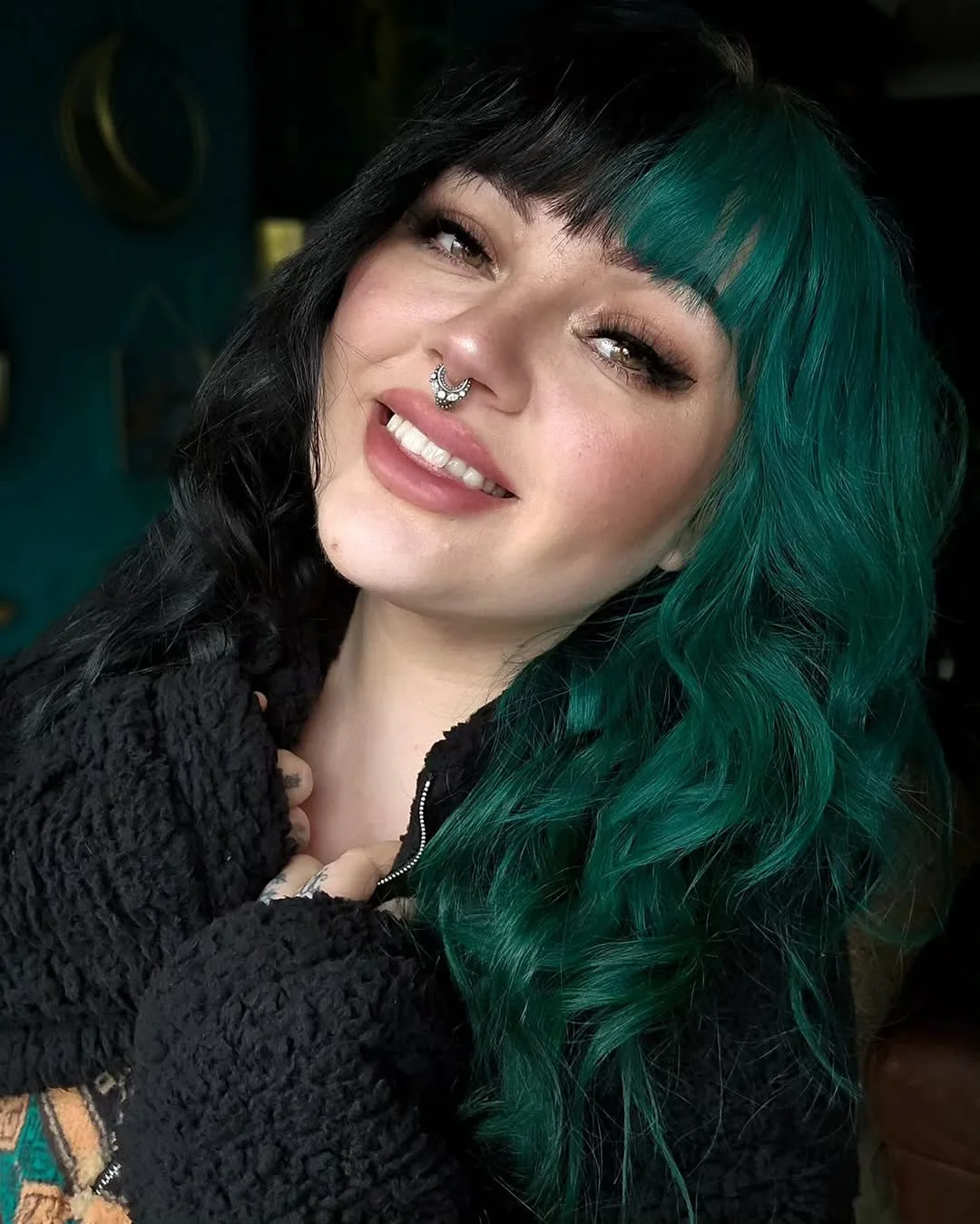 chest wavy teal layers with curtain fringe shown as a bangs for round face idea