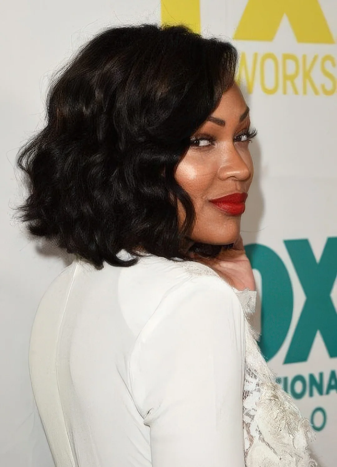 Black wavy bob with jaw dropping volume.