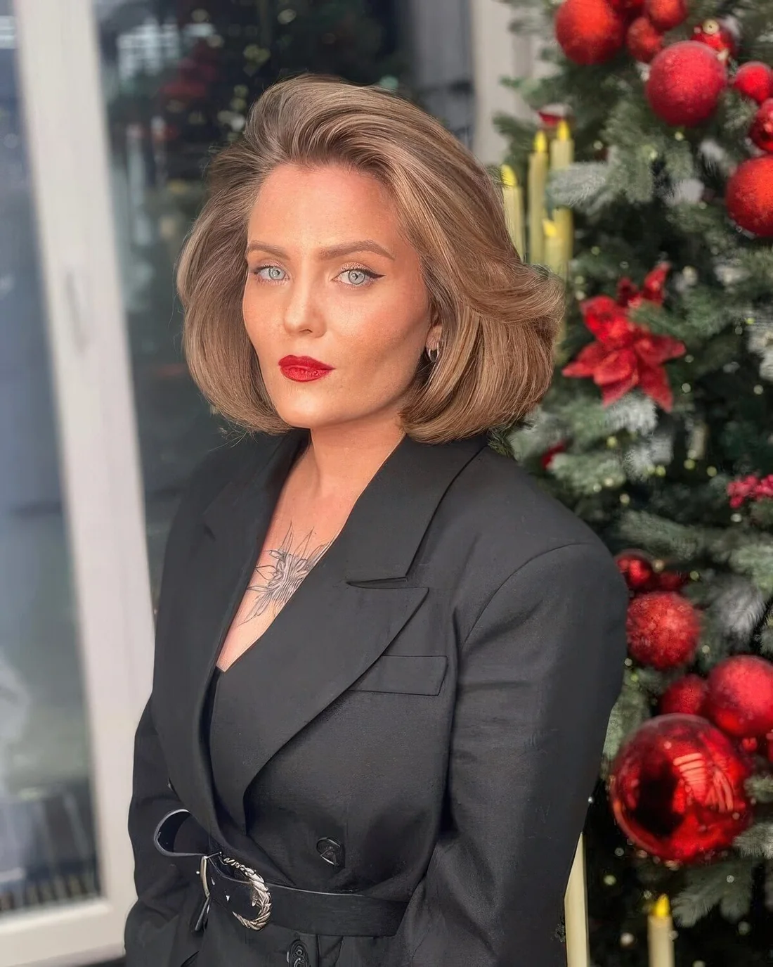 Bronde midi bob with massive volume and waves.