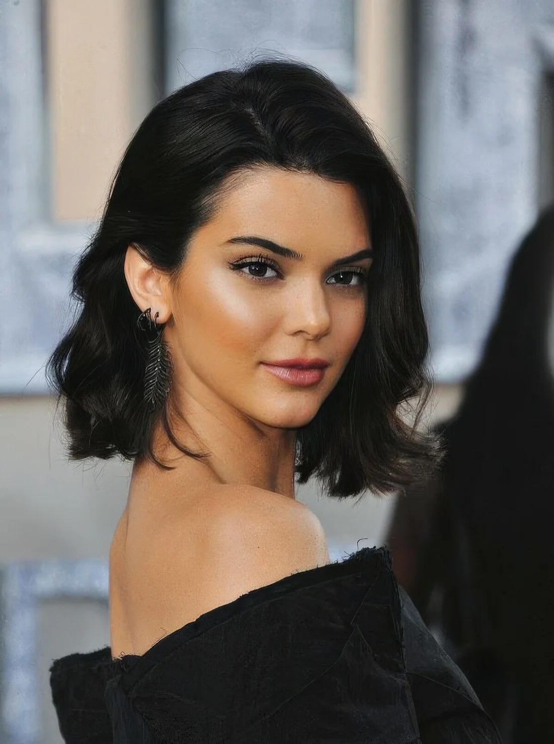Kendall Jenner wearing a glam black baroque haircut.