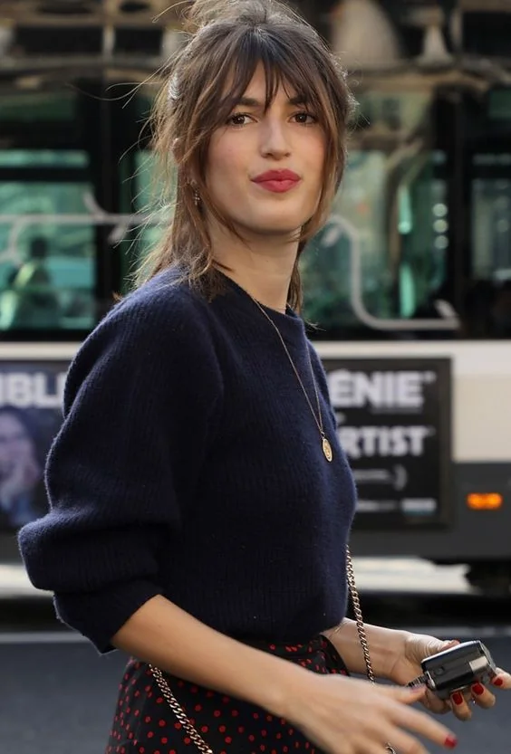 Photo showing updo hairstyle, with the hairstyle clearly visible.