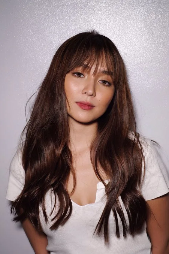 Photo showing balayage hairstyle, with the hairstyle clearly visible.