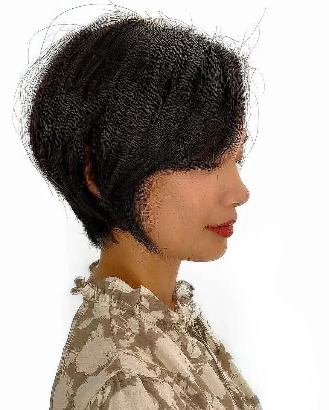 Photo showing straight bixie with side bangs, with the hairstyle clearly visible.