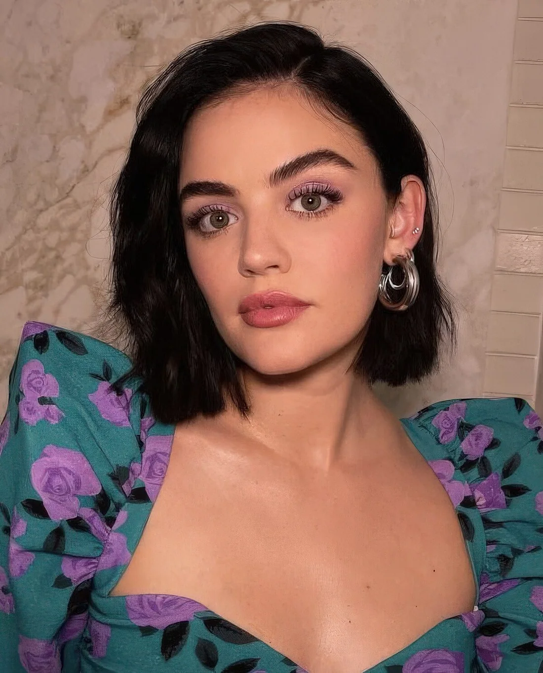 Black wavy midi bob with side part and a lot of texture always.