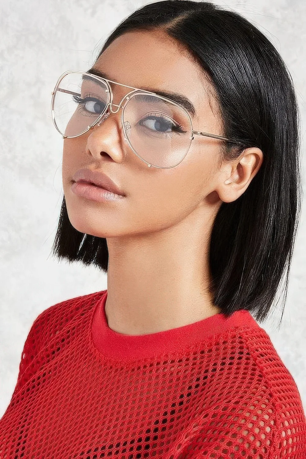 Long black bob with middle part and straight hair but volume.