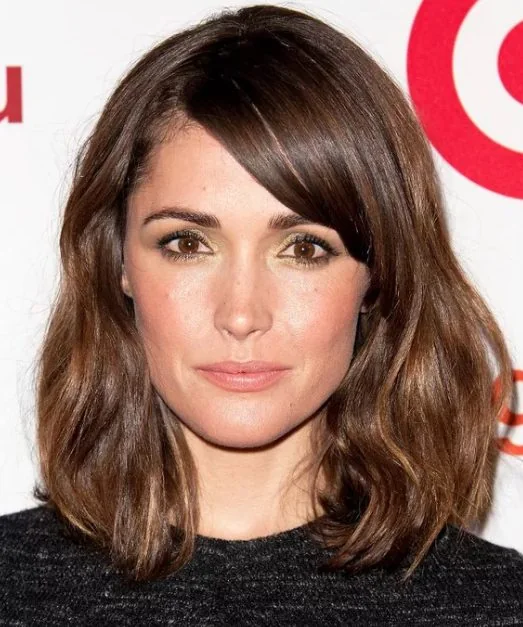 Blunt bangs don't have to be taken at face value, plus they look perfect paired with mid length hair like here.
