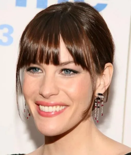 Photo showing liv Tyler's stylish updo, with the hairstyle clearly visible.