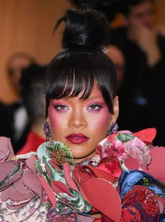 With bangs slightly on the longer side, Rihanna.
