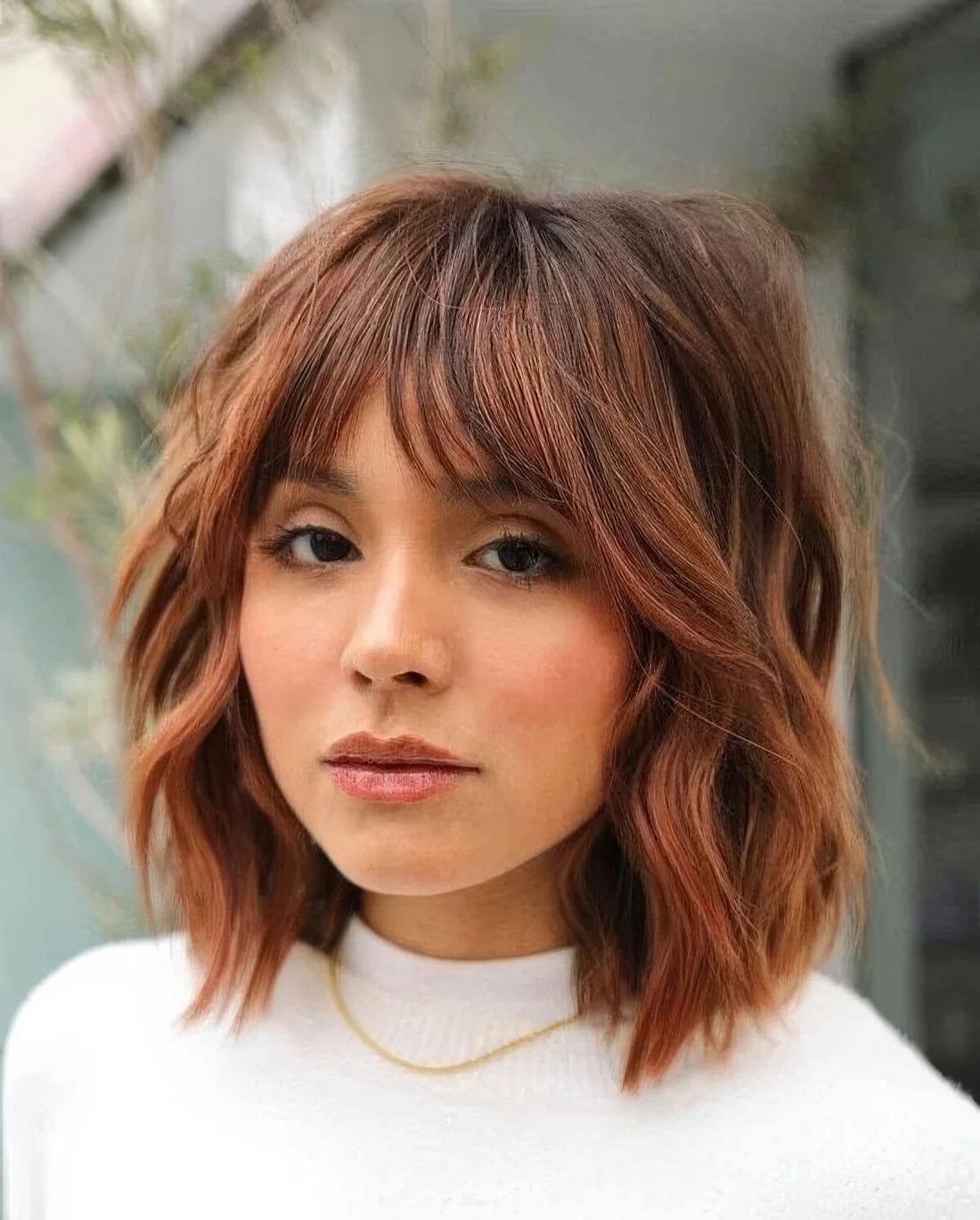 Photo showing shaggy bob hairstyle, with the hairstyle clearly visible.