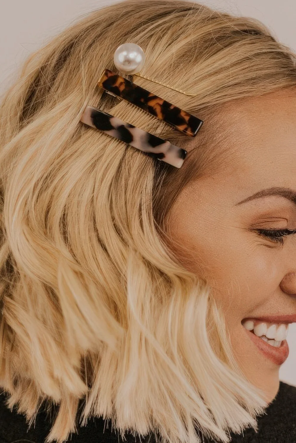 Photo showing mix and match clips, with the hairstyle clearly visible.